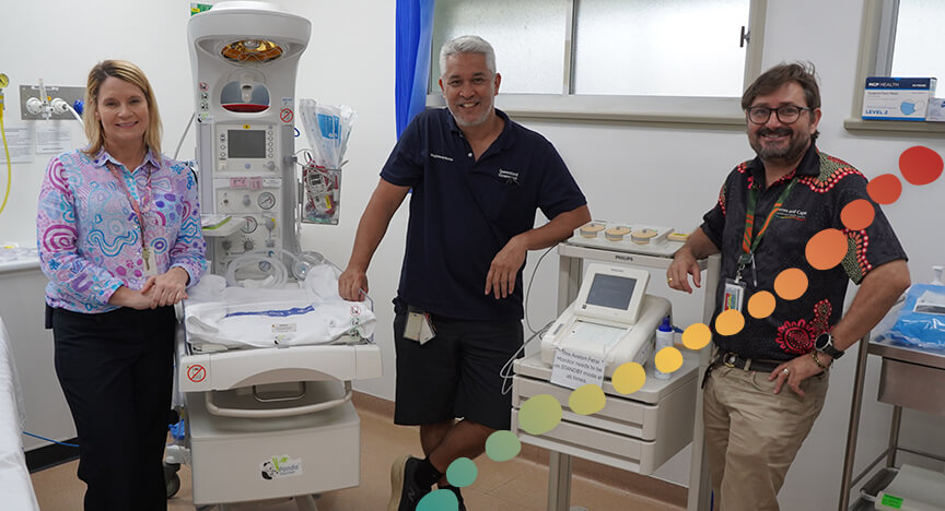 3 people standing in a maternity suite in a hospital